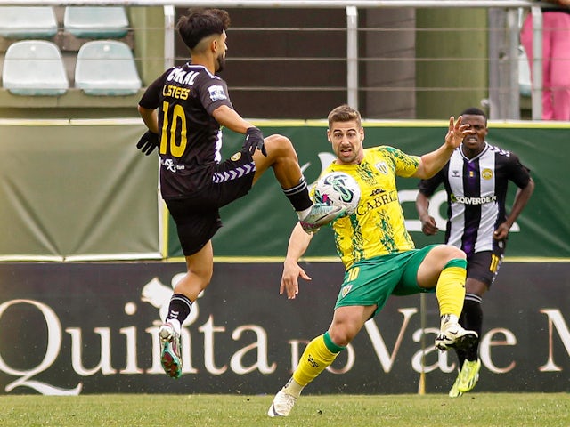 Luis Esteves (L) in action for Nacional on May 12, 2024