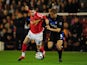 Manchester United's Wes Brown and Barnsley's Adam Hammill battle on October 27, 2009