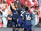 Manchester United's Marcus Rashford celebrates with Diogo Dalot and Amad Diallo on September 14, 2024