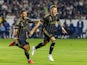 Denis Bouanga and Mateusz Bogusz celebrate a goal for Los Angeles FC on September 14, 2024