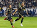 Denis Bouanga and Mateusz Bogusz celebrate a goal for Los Angeles FC on September 14, 2024