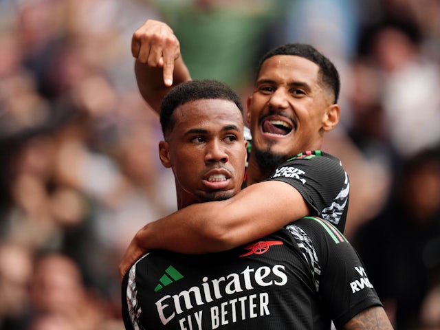 Arsenal's Gabriel Magalhaes celebrates with William Saliba after scoring on September 15, 2024