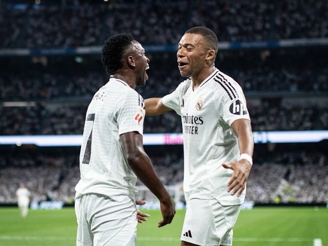 Real Madrid's Kylian Mbappé celebrates with Vinicius Jr. on September 21, 2024