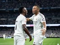 Real Madrid's Kylian Mbappe celebrates with Vinicius Junior celebrates on September 21, 2024