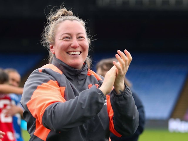 Crystal Palace Women's manager Laura Kaminski applauds the fans on April 28, 2024