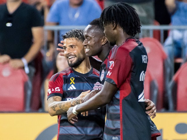 Toronto teammates Lorenzo Insigne, Richie Laryea and Deandre Kerr celebrate a goal on September 14, 2024