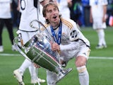 Real Madrid's Luka Modric celebrates with the Champions League trophy on June 1, 2024