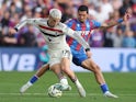 Crystal Palace's Daniel Munoz in action with Manchester United's Alejandro Garnacho on September 21, 2024