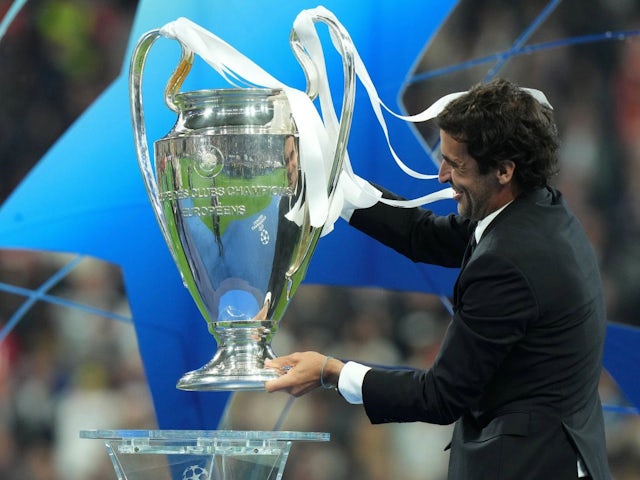 Raul Gonzalez of Real Madrid brings the Champions League trophy on the pitch on May 28, 2022