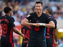 Barcelona's Robert Lewandowski celebrates scoring on September 22, 2024