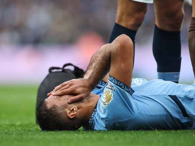 Manchester City's Rodri reacts after sustaining an injury on September 22, 2024