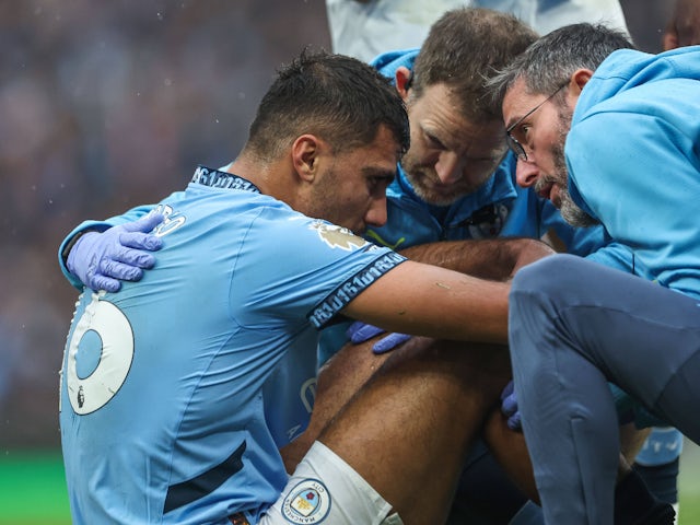 Manchester City's Rodri receives treatment after sustaining an injury on September 22, 2024