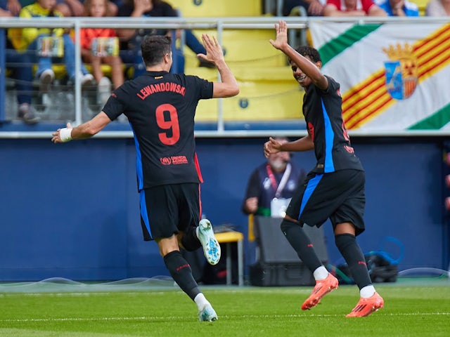 Barcelona's Robert Lewandowski celebrates scoring against Villarreal on September 22, 2024