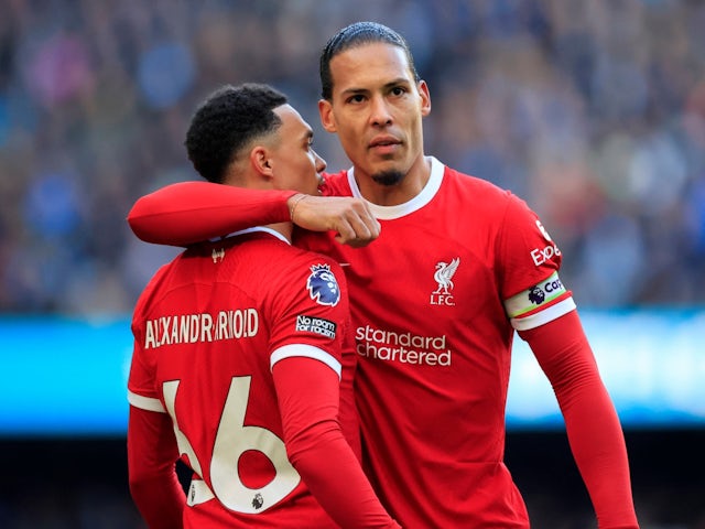 Sport News Liverpool's Virgil van Dijk celebrates with teammate Trent Alexander-Arnold on November 25, 2023