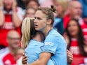 Manchester City's Vivianne Miedema celebrates scoring on September 21, 2024