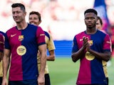 Barcelona's Ansu Fati and Robert Lewandowski on August 12, 2024