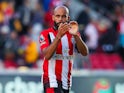 Brentford's Bryan Mbeumo applauds fans after the game on September 28, 2024