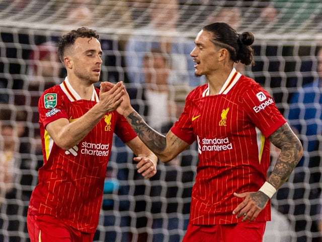 Liverpool's Diogo Jota celebrates scoring their first goal with Darwin Nunez on September 25, 2024