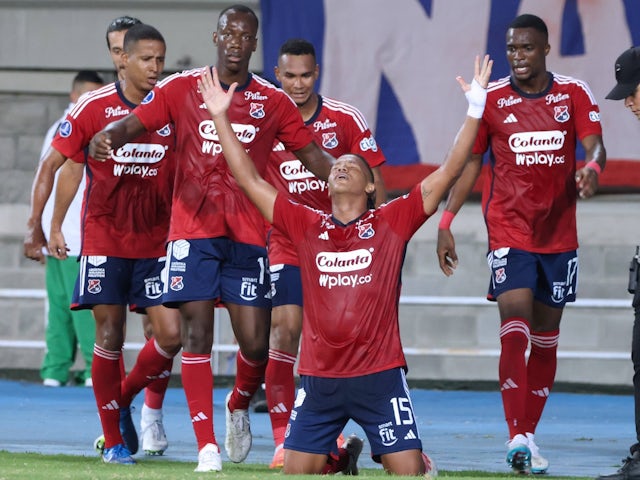 Jaime Alvarado is surrouded by teammates after scoring for Independiente Medellin on August 21, 2024