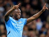 Manchester City's Jeremy Doku celebrates scoring their first goal on September 24, 2024