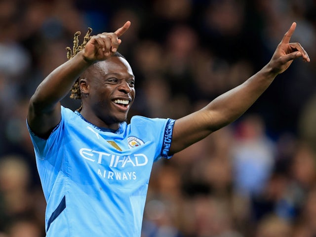 Manchester City's Jeremy Doku celebrates scoring their first goal on September 24, 2024