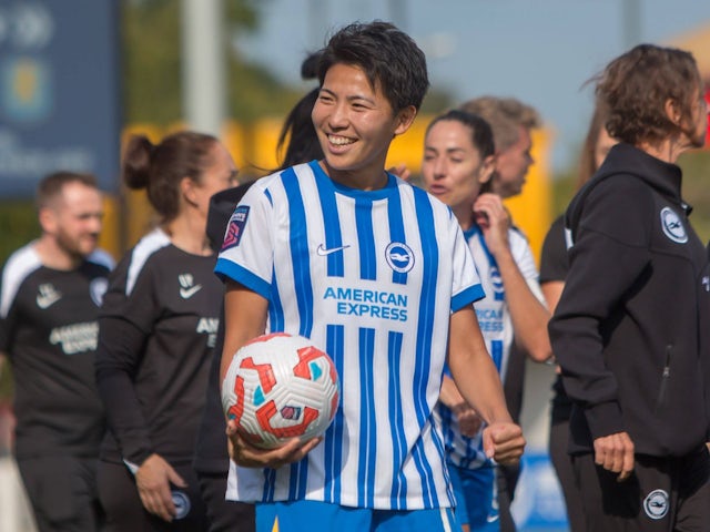 Brighton & Hove Albion Women's Kiko Seike celebrates with the match ball on September 21, 2024