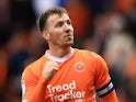 Lee Evans of Blackpool celebrates scoring his team's third goal during his side's match against Burton Albion, on September 28, 2024