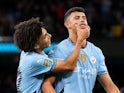 Manchester City's Matheus Nunes celebrates scoring with Rico Lewis on September 24, 2024