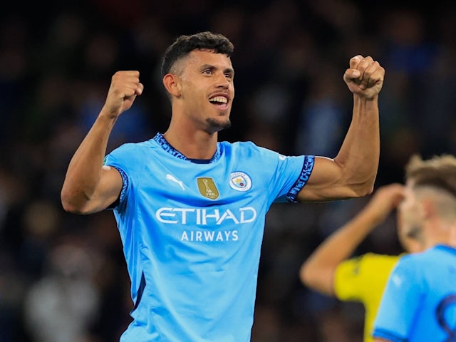 Manchester City's Matheus Nunes celebrates scoring his first goal on September 24, 2024