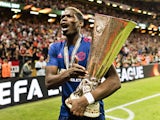 Manchester United's Paul Pogba celebrates with the Europa League trophy on May 24, 2017