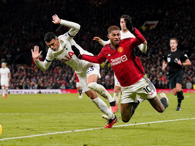 Tottenham Hotspur's Pedro Porro and Manchester United's Marcus Rashford clash on January 19, 2024