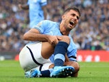 Manchester City' Rodri reacts after sustaining an injury on September 22, 2024