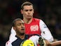 Arsenal's Thomas Vermaelen and Bolton Wanderers' David N'Gog pictured on February 1, 2012