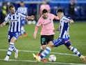 Florian Lejeune of Alaves and Lionel Messi of Barcelona on October 31, 2020