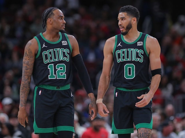 Oshay Brissett and Jayson Tatum of the Boston Celtics on March 23, 2024