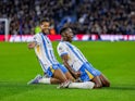 Danny Welbeck (18) of Brighton & Hove Albion scores a goal and celebrates during the Premier League match on October 6, 2024