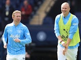 Manchester City's Erling Haaland and Kevin De Bruyne during the warm-up on August 24, 2024