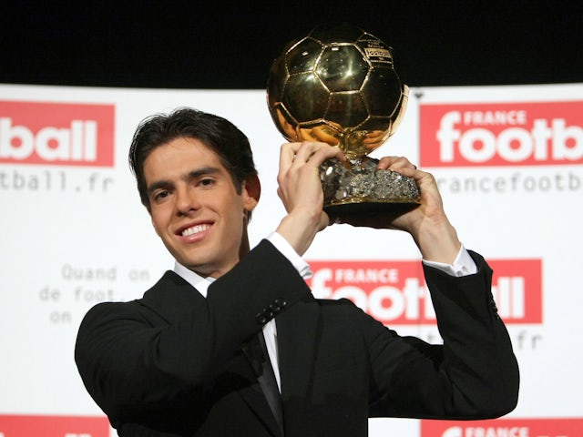 Kaka poses with the Ballon d'Or trophy in 2007