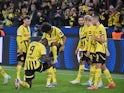 Karim Adeyemi celebrates with Borussia Dortmund teammates on October 1, 2024