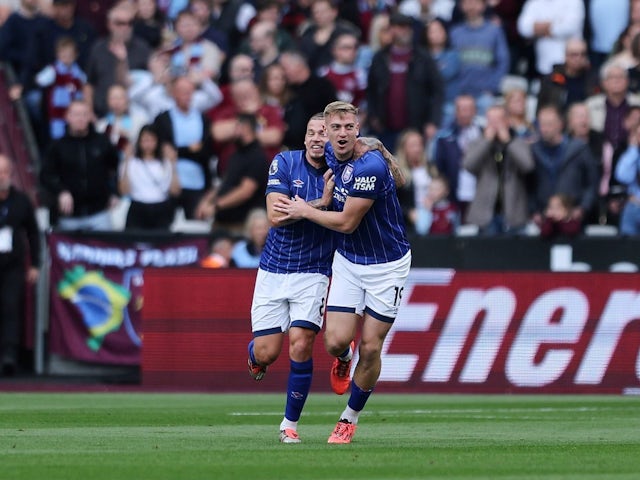 Liam Delap of Ipswich Town (right) celebrates scoring against West Ham United with Kalvin Phillips (left), on October 5, 2024