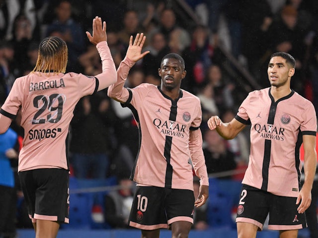 Celebration of Bradley Barcola (L), Ousmane Dembele (C) and Achraf Hakimi  on September 30, 2024