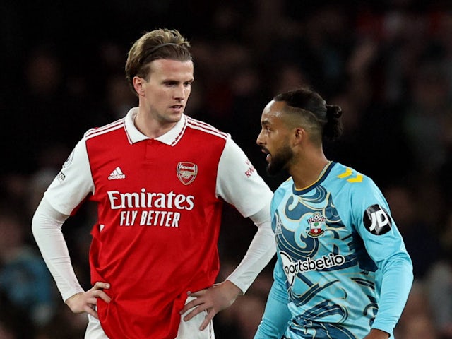 Arsenal's Rob Holding and Southampton's Theo Walcott pictured in April 2023