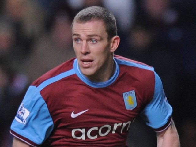 Richard Dunne in action for Aston Villa in 2010