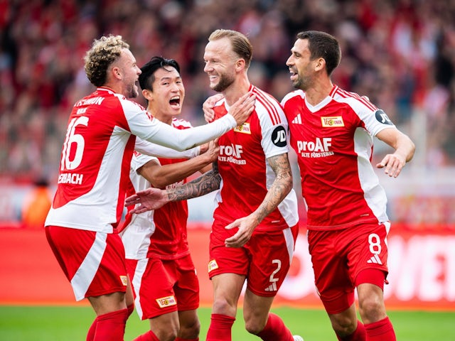 Union Berlin players celebrate scoring on October 5, 2024