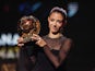 Barcelona Women midfielder Aitana Bonmati poses with the Ballon d'Or trophy on October 30, 2023