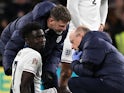 Arsenal and England attacker Bukayo Saka receives treatment for an injury on October 10, 2024