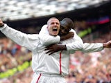 David Beckham celebrates scoring for England against Greece on October 6, 2001