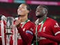 Liverpool's Ibrahima Konate and Virgil van Dijk celebrate winning the EFL Cup on February 25, 2024