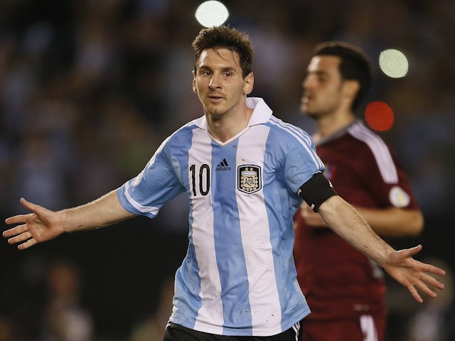 Argentina's Lionel Messi celebrates scoring on March 22, 2013