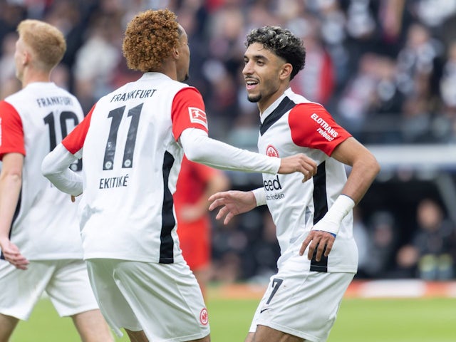 Eintracht Frankfurt Hugo Ekitike celebrates with Omar Marmoush on October 6, 2024